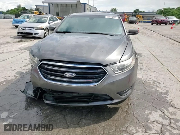 2014 Ford Taurus SEL z VIN 1FAHP2E80EG174910, wystawiony jako Copart lot #56070945 z przebiegiem 147 201 mil mil oraz Szkody całkowita. Historia ofert i sprzedaży dostępna na DreamBid. Obrazek 13.