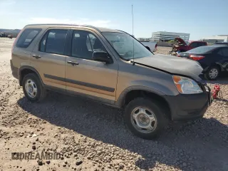 2004 Honda CR-V LX with VIN JHLRD68494C005789, listed as a Copart auction lot 52976635 with 127,519 mi miles and Salvage Title. Bid and sale history available at carsss.com. Image 4.