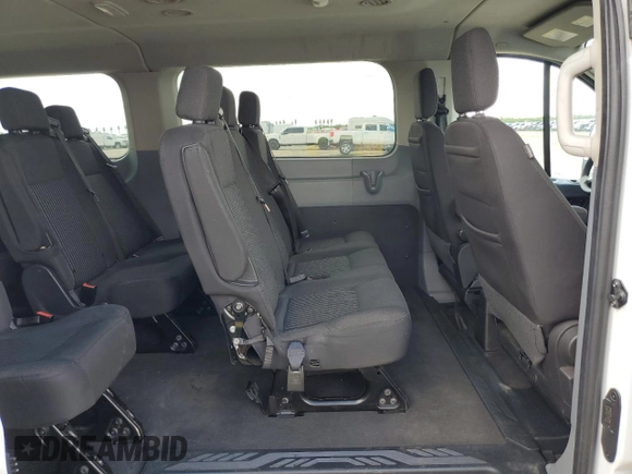 2018 Ford Transit Passenger XL z VIN 1FBZX2YM4JKA58192, wystawiony jako Copart lot #51863155 z przebiegiem 199 358 mil mil oraz Czysty tytuł • Clean title. Historia ofert i sprzedaży dostępna na DreamBid. Obrazek 11.