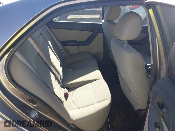 2012 Kia Forte EX with VIN KNAFU4A24C5560114, listed as a IAAI auction lot 41669309 with 236,464 mi miles. Bid and sale history available at carsss.com. Image 8.