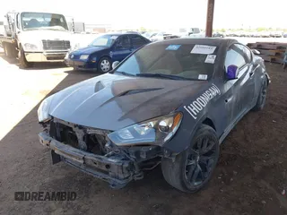 2013 Hyundai Genesis Coupe R-Spec with VIN KMHHU6KJ8DU079718, listed as a IAAI auction lot 42603184 with 105,660 mi miles and . Bid and sale history available at DreamBid. Image 6.