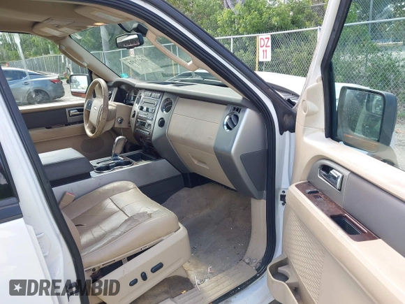 2014 Ford Expedition King Ranch with VIN 1FMJU1J50EEF14445, listed as a IAAI auction lot 42571073 with 125,174 mi miles and . Bid and sale history available at DreamBid. Image 5.