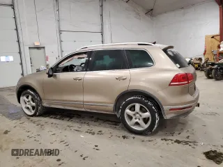2016 Volkswagen Touareg Sport with VIN WVGEF9BP3GD010197, listed as a Copart auction lot 85826584 with 106,375 mi miles and Salvage Title. Bid and sale history available at DreamBid. Image 2.