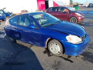 2002 Honda Insight z VIN JHMZE14722T000006, wystawiony jako IAAI lot #41049894 z przebiegiem 185 989 mil mil oraz . Historia ofert i sprzedaży dostępna na DreamBid. Obrazek 1.