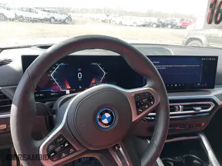 2024 BMW i4 xDrive40 with VIN WBY83FB04RFT19615, listed as a IAAI auction lot 41679918 with 3,883 mi miles. Bid and sale history available at carsss.com. Image 18.