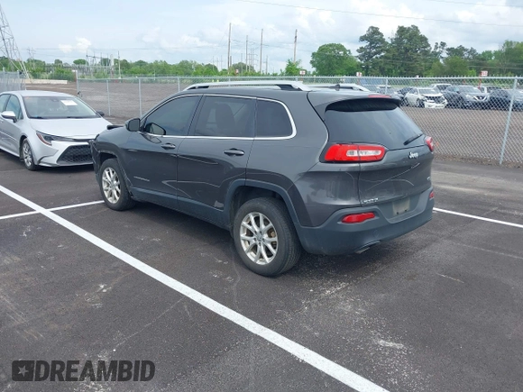 2015 Jeep Cherokee Latitude with VIN 1C4PJLCB5FW689811, listed as a IAAI auction lot 42113567 with 113,740 mi miles and . Bid and sale history available at carsss.com. Image 3.