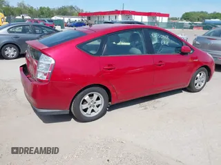 2009 Toyota Prius with VIN JTDKB20U293475940, listed as a IAAI auction lot 42150468 with 112,556 mi miles and . Bid and sale history available at DreamBid. Image 4.