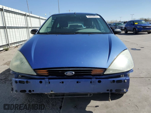 2004 Ford Focus ZX3 with VIN 3FAFP313X4R123879, listed as a Copart auction lot 54052055 with 174,692 mi miles and Salvage Title. Bid and sale history available at carsss.com. Image 5.