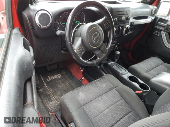 2012 Jeep Wrangler Arctic z VIN 1C4AJWBG9CL123832, wystawiony jako Copart lot #87376204 z przebiegiem 174 097 mil mil oraz Szkoda całkowita • Salvage title. Historia ofert i sprzedaży dostępna na DreamBid. Obrazek 8.