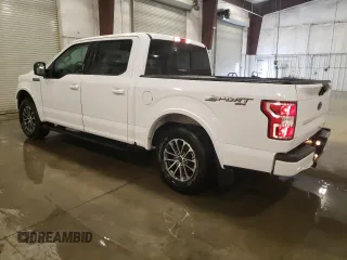 2020 Ford F-150 XL with VIN 1FTEW1EP7LKD90569, listed as a Copart auction lot 53040155 with 49,708 mi miles and Salvage Title. Bid and sale history available at DreamBid. Image 2.