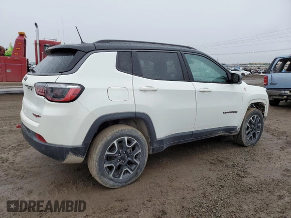 2021 Jeep Compass Trailhawk with VIN 3C4NJDDB5MT590369, listed as a Copart auction lot 46107685 with 67,857 mi miles and Salvage title. Bid and sale history available at DreamBid. Image 3.