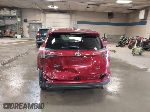 2018 Toyota RAV4 LE with VIN 2T3BFREV9JW825953, listed as a IAAI auction lot 42463780 with 74,128 mi miles and . Bid and sale history available at DreamBid. Image 16.