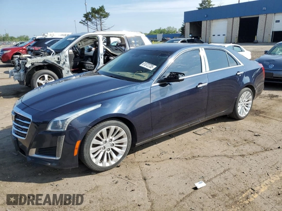 2015 Cadillac CTS Luxury AWD with VIN 1G6AX5SX7F0125516, listed as a Copart auction lot 61072735 with 111,448 mi miles and Clean title. Bid and sale history available at DreamBid. Image 1.