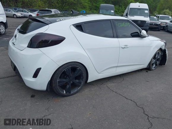 2012 Hyundai Veloster w/Gray Int with VIN KMHTC6AD6CU021176, listed as a IAAI auction lot 42205695 with 93,665 mi miles and . Bid and sale history available at DreamBid. Image 4.