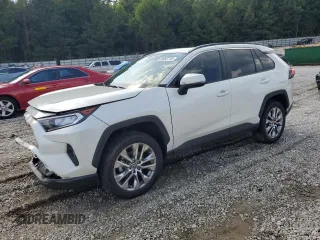 2021 Toyota RAV4 XLE Premium with VIN 2T3A1RFV6MW142184, listed as a Copart auction lot 60983715 with 31,814 mi miles and Salvage title. Bid and sale history available at DreamBid. Image 1.