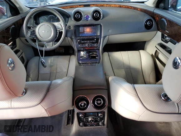 2011 Jaguar XJ with VIN SAJWA1CB4BLV07268, listed as a Copart auction lot 46994555 with 102,432 mi miles and Salvage title. Bid and sale history available at DreamBid. Image 8.