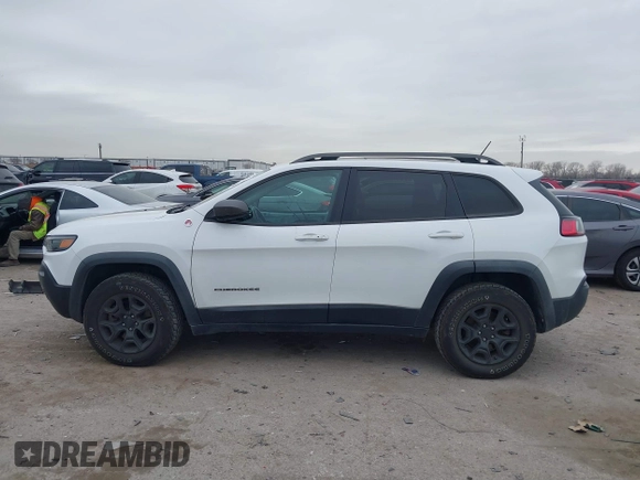 2019 Jeep Cherokee Trailhawk with VIN 1C4PJMBN6KD124023, listed as a IAAI auction lot 41432217 with 76,934 mi miles and . Bid and sale history available at DreamBid. Image 15.