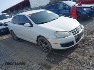 2009 Volkswagen Jetta S z VIN 3VWJM71K89M126759, wystawiony jako IAAI lot #41089190 z przebiegiem 217 559 mil mil oraz . Historia ofert i sprzedaży dostępna na DreamBid. Obrazek 1.