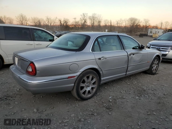 2005 Jaguar XJ with VIN SAJWA79C55SG37981, listed as a Copart auction lot 81142484 with 128,601 mi miles and Salvage Title. Bid and sale history available at carsss.com. Image 3.