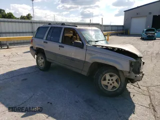 1994 Jeep Grand Cherokee Laredo z VIN 1J4GZ58S5RC328902, wystawiony jako Copart lot #70150474 z przebiegiem 195 604 mil mil oraz Szkoda całkowita • Salvage title. Historia ofert i sprzedaży dostępna na DreamBid. Obrazek 4.