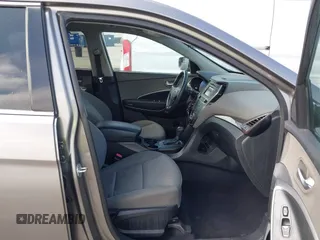 2018 Hyundai Santa Fe 2.4L with VIN 5NMZT3LB4JH069868, listed as a IAAI auction lot 42675555 with 142,612 mi miles and . Bid and sale history available at DreamBid. Image 5.