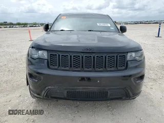 2018 Jeep Grand Cherokee Laredo E with VIN 1C4RJEAG4JC182430, listed as a Copart auction lot 50740255 with 117,944 mi miles and Salvage title. Bid and sale history available at DreamBid. Image 5.