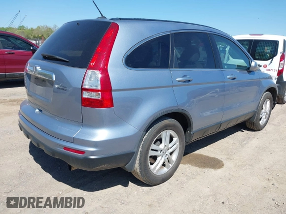 2011 Honda CR-V EX-L with VIN 5J6RE3H79BL022649, listed as a IAAI auction lot 42042588 with 126,268 mi miles. Bid and sale history available at carsss.com. Image 4.