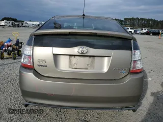 2005 Toyota Prius z VIN JTDKB20U053070122, wystawiony jako Copart lot #86879114 z przebiegiem Nie podano mil oraz Szkoda całkowita • Salvage title. Historia ofert i sprzedaży dostępna na DreamBid. Obrazek 6.
