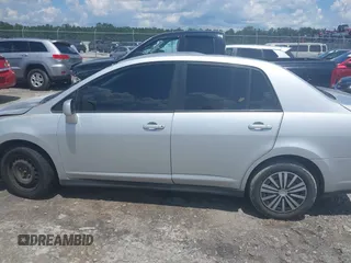 2011 Nissan Versa S with VIN 3N1BC1AP4BL446596, listed as a IAAI auction lot 42425302 with 141,047 mi miles and . Bid and sale history available at DreamBid. Image 14.