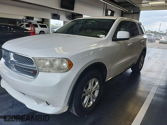 2013 Dodge Durango SXT with VIN 1C4RDJAG8DC671689, listed as a IAAI auction lot 42743958 with 160,950 mi miles and . Bid and sale history available at DreamBid. Image 16.