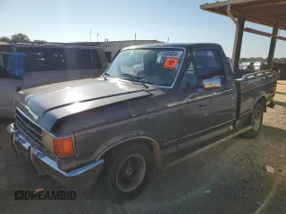 1990 Ford F-150 "S" with VIN 1FTDF15Y8LNA66730, listed as a Copart auction lot 72320024 with 41,844 mi miles and Salvage Title. Bid and sale history available at carsss.com. Image 1.