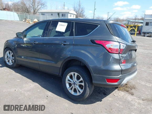 2017 Ford Escape SE with VIN 1FMCU9GD5HUC17297, listed as a IAAI auction lot 41880013 with 57,737 mi miles and . Bid and sale history available at DreamBid. Image 3.