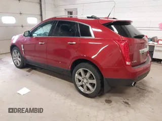 2012 Cadillac SRX Performance Collection with VIN 3GYFNEE36CS657582, listed as a IAAI auction lot 42084319 with 171,335 mi miles. Bid and sale history available at carsss.com. Image 3.