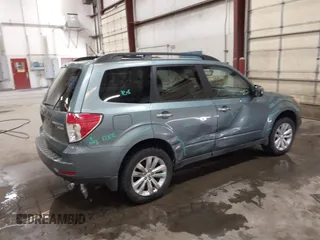 2011 Subaru Forester X Limited with VIN JF2SHAEC5BH773501, listed as a IAAI auction lot 42194123 with 142,902 mi miles and . Bid and sale history available at DreamBid. Image 4.