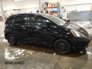 2009 Honda Fit with VIN JHMGE88259S053426, listed as a Copart auction lot 87894815 with 143,665 mi miles and Salvage Title. Bid and sale history available at carsss.com. Image 4.