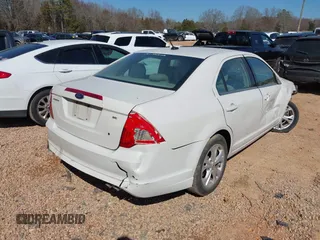 2012 Ford Fusion SE with VIN 3FAHP0HAXCR427773, listed as a IAAI auction lot 41640675 with 166,234 mi miles and . Bid and sale history available at carsss.com. Image 4.