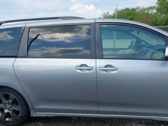 2011 Toyota Sienna SE with VIN 5TDXK3DC4BS152605, listed as a IAAI auction lot 42197758 with 202,829 mi miles and . Bid and sale history available at DreamBid. Image 13.