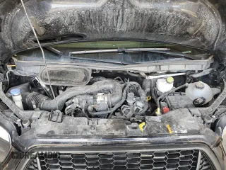 2021 Ford Transit Cargo with VIN 1FTBR1C82MKA77940, listed as a Copart auction lot 49711275 with 34,989 mi miles and Salvage Title. Bid and sale history available at DreamBid. Image 12.