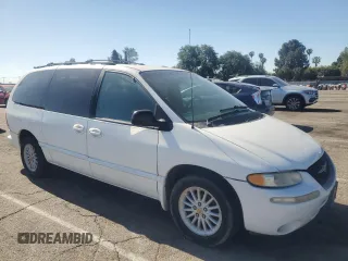 2000 Chrysler Town & Country LX z VIN 1C4GP44R9YB793616, wystawiony jako Copart lot #55903065 z przebiegiem 50 987 mil mil oraz Czysty tytuł • Clean title. Historia ofert i sprzedaży dostępna na DreamBid. Obrazek 4.