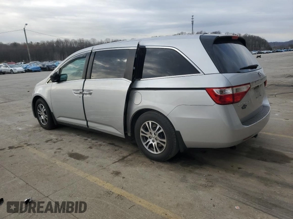2012 Honda Odyssey EX-L with VIN 5FNRL5H60CB117376, listed as a Copart auction lot 50740725 with 163,716 mi miles and Salvage Title. Bid and sale history available at DreamBid. Image 2.