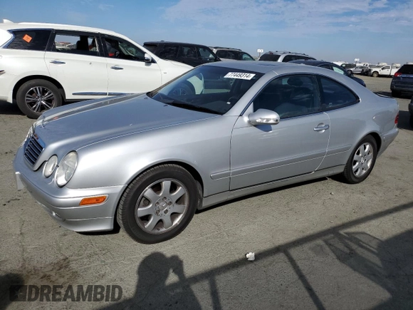 2000 Mercedes-Benz CLK 320/430 with VIN WDBLJ65G8YF122308, listed as a Copart auction lot 77449314 with 105,121 mi miles and Salvage Title. Bid and sale history available at DreamBid. Image 1.
