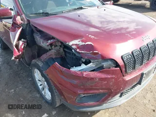 2019 Jeep Cherokee Latitude with VIN 1C4PJMCB2KD473832, listed as a IAAI auction lot 41555931 with 104,990 mi miles and . Bid and sale history available at DreamBid. Image 6.