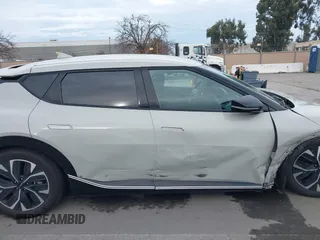 2022 Kia EV6 Wind with VIN KNDC34LA9N5043553, listed as a IAAI auction lot 41576789 with 133,401 mi miles and . Bid and sale history available at DreamBid. Image 13.
