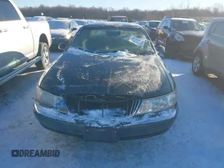 1998 Lincoln Continental with VIN 1LNFM97V4WY713283, listed as a IAAI auction lot 41264918 with 89,134 mi miles. Bid and sale history available at carsss.com. Image 12.