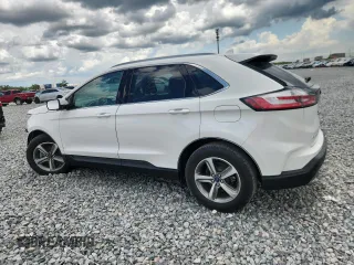 2020 Ford Edge SEL с VIN 2FMPK3J95LBA94317, выставлен на аукционе Copart как лот 62389575 с пробегом 38 523 миль миль и Списание • Salvage title. История ставок и продаж доступна на DreamBid. Изображение 2.