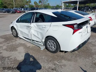 2022 Toyota Prius L Eco with VIN JTDKAMFUXN3163123, listed as a IAAI auction lot 41666679 with 68,026 mi miles. Bid and sale history available at carsss.com. Image 3.