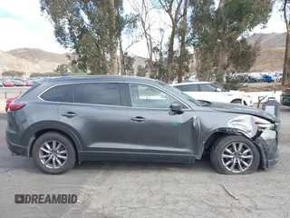 2018 Mazda CX-9 Sport with VIN JM3TCABY1J0224741, listed as a IAAI auction lot 41265876 with 126,686 mi miles and . Bid and sale history available at DreamBid. Image 14.