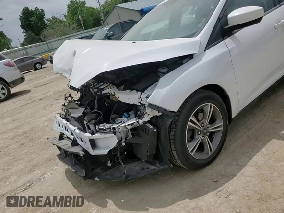 2018 Ford Focus SE with VIN 1FADP3F27JL264670, listed as a Copart auction lot 57184815 with 35,187 mi miles and Salvage title. Bid and sale history available at DreamBid. Image 14.