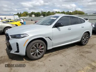 2025 BMW X6 M60i with VIN 5UX43EX06S9W68023, listed as a Copart auction lot 69874764 with 3,789 mi miles and Salvage Title. Bid and sale history available at carsss.com. Image 1.