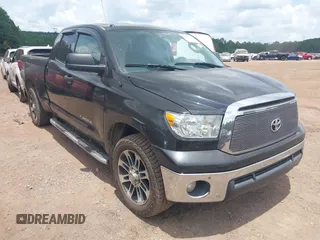 2012 Toyota Tundra with VIN 5TFRM5F12CX047602, listed as a IAAI auction lot 42488888 with 301,102 mi miles and . Bid and sale history available at DreamBid. Image 1.